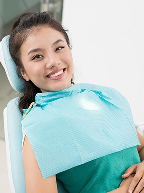 Smiling woman in dental chair