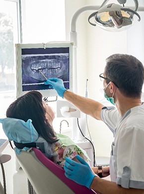 dentist in Manchester showing a patient their X-rays