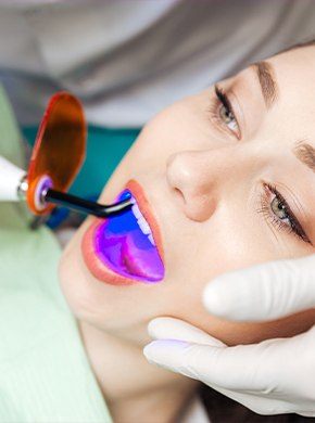 Patient receiving dental bonding