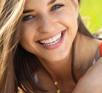 woman smiling after dental bonding in Manchester