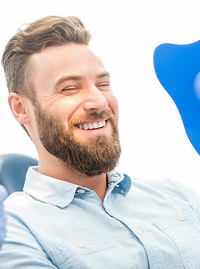 man smiling after periodontal therapy in Manchester