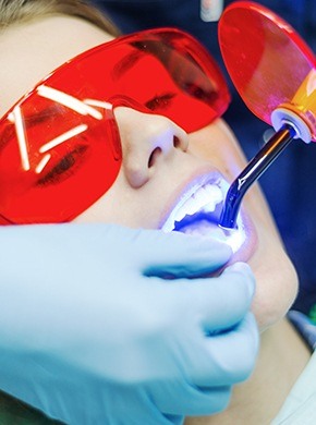 Patient receiving dental sealants