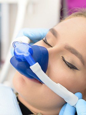 Patient with nitrous oxide nasal mask in place