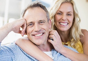 Smiling older man and woman